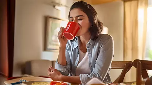 Disfrutando Nescafé